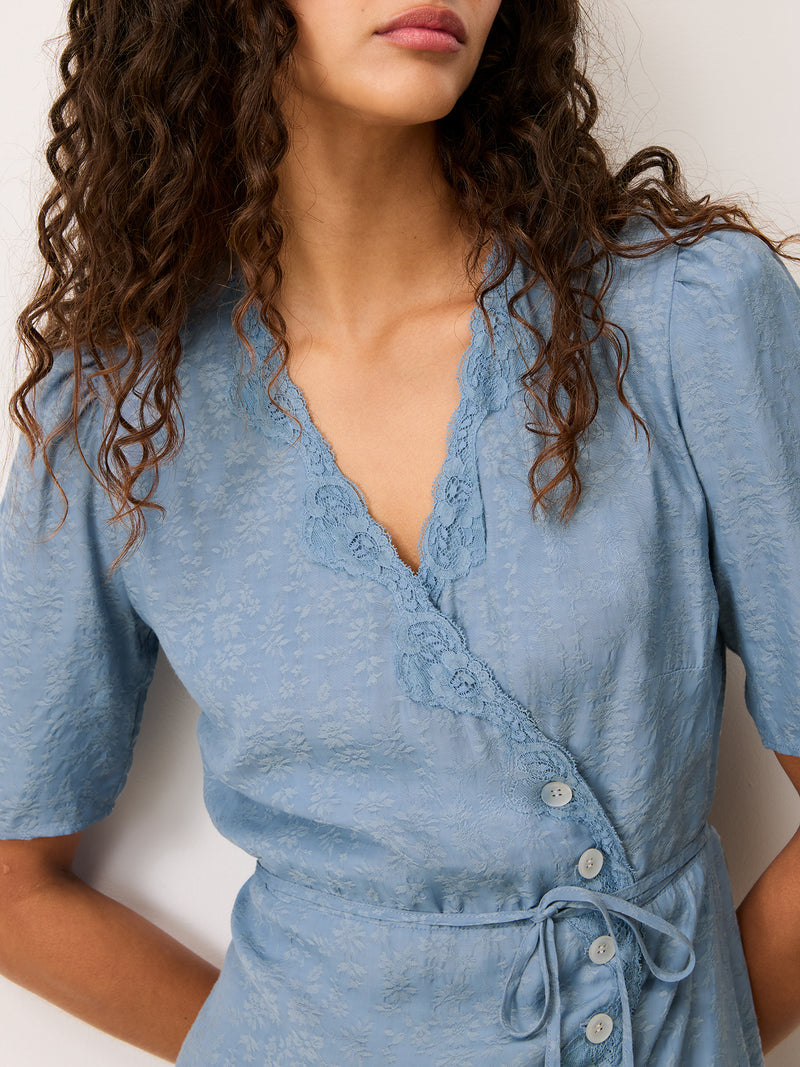 GABIN sky blue lace wrap midi dress worn on a model by Rouje