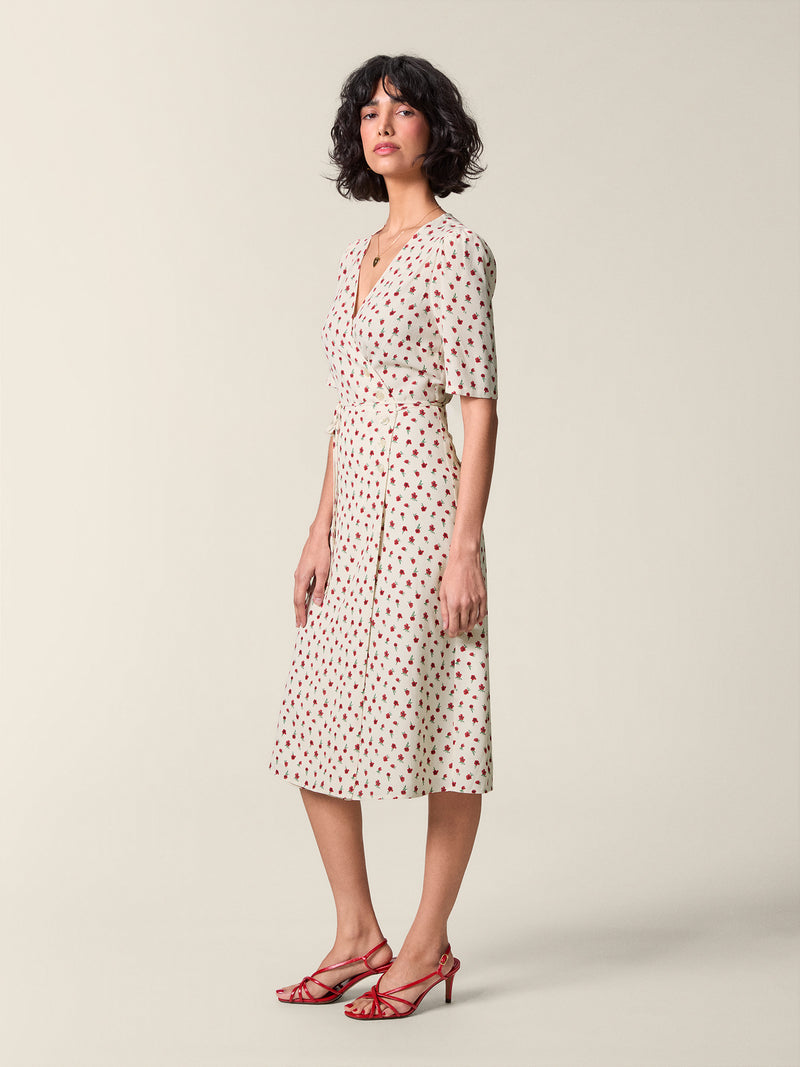 Side view of the floral-print Gabin dress tied at the waist.