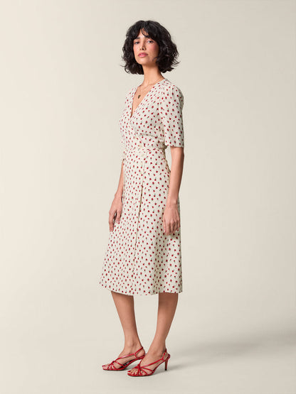 Side view of the floral-print Gabin dress tied at the waist.