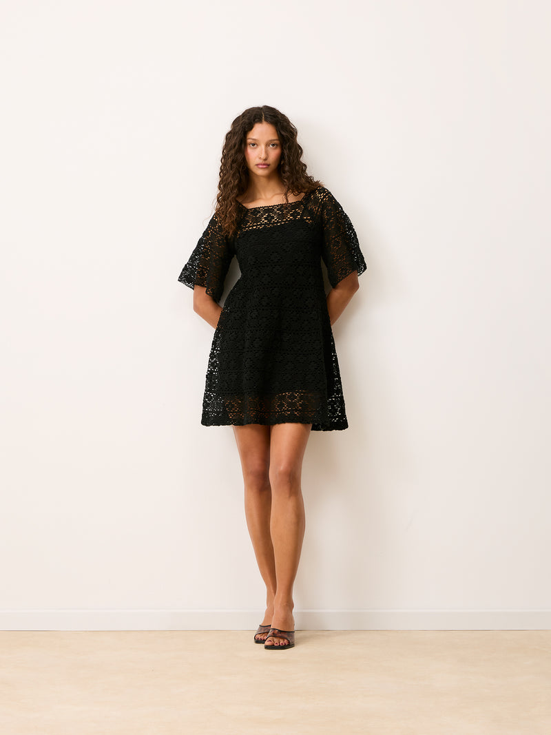 HOLLY black macrame dress worn on a model by Rouje