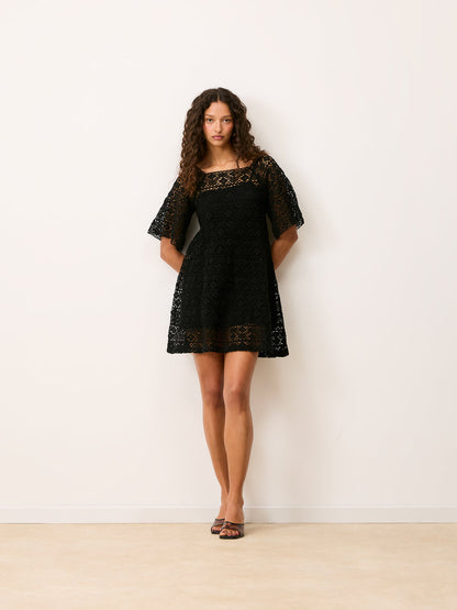HOLLY black macrame dress worn on a model by Rouje