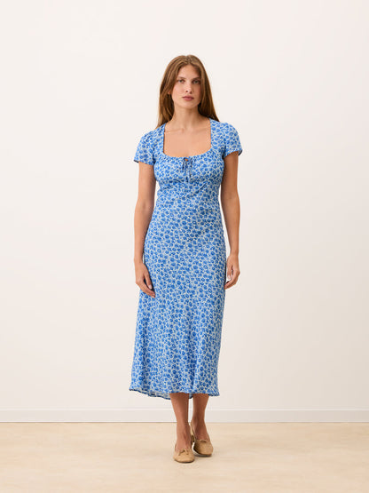 INES blue Rose Radieuse floral midi dress, back view by Rouje