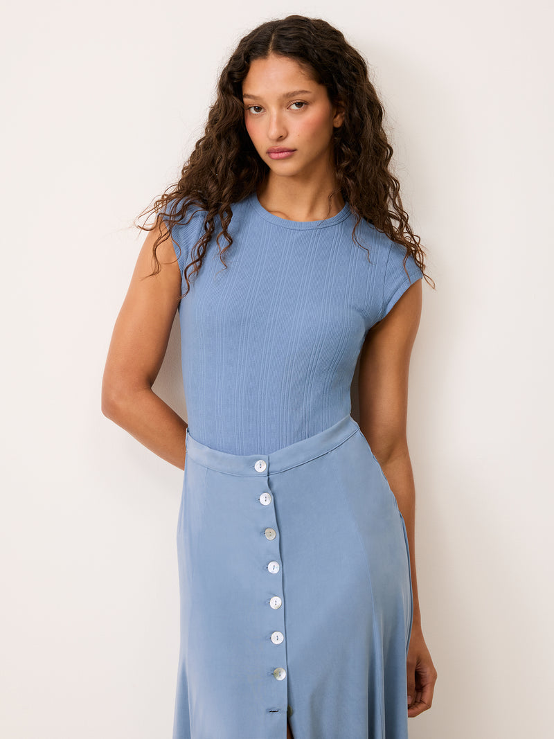 MAMBO sky blue Mist knit dress, detail of cupro skirt by Rouje
