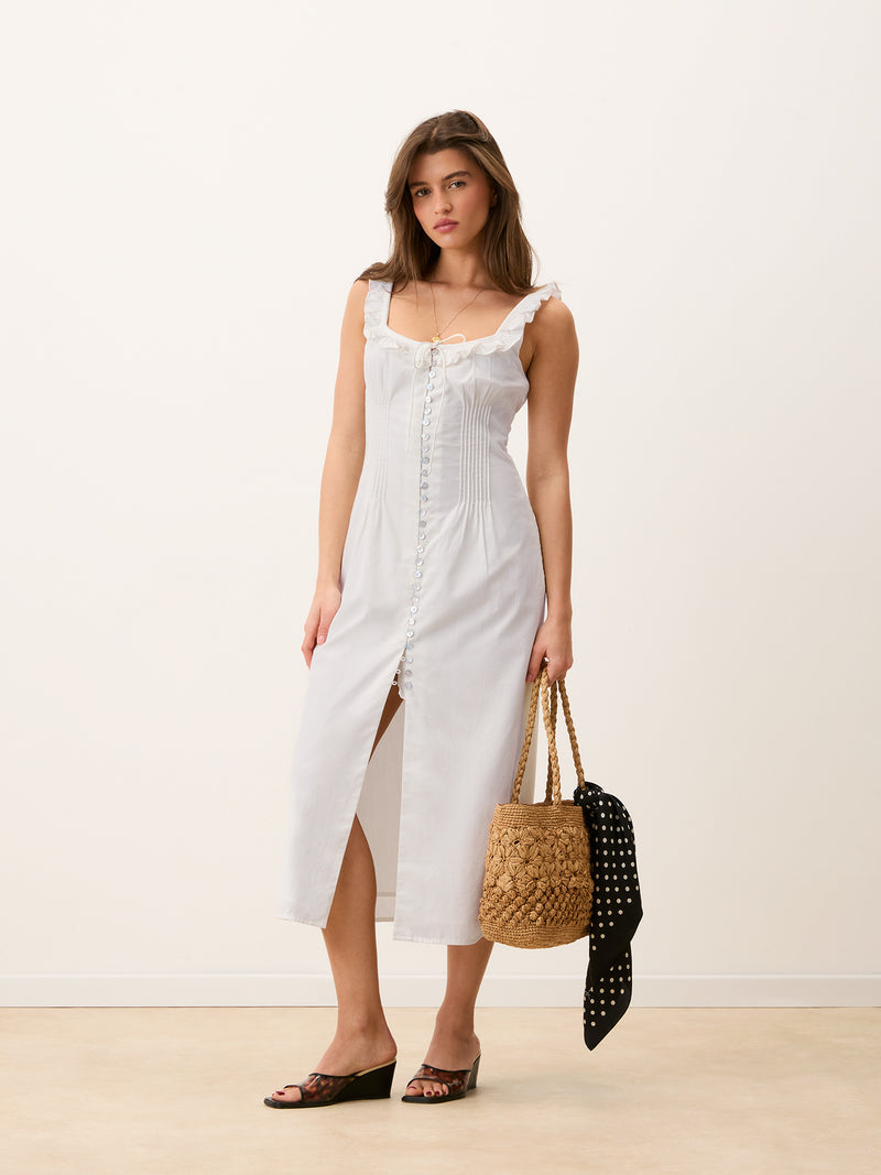 MONIQUE white corset style midi dress worn on a model by Rouje