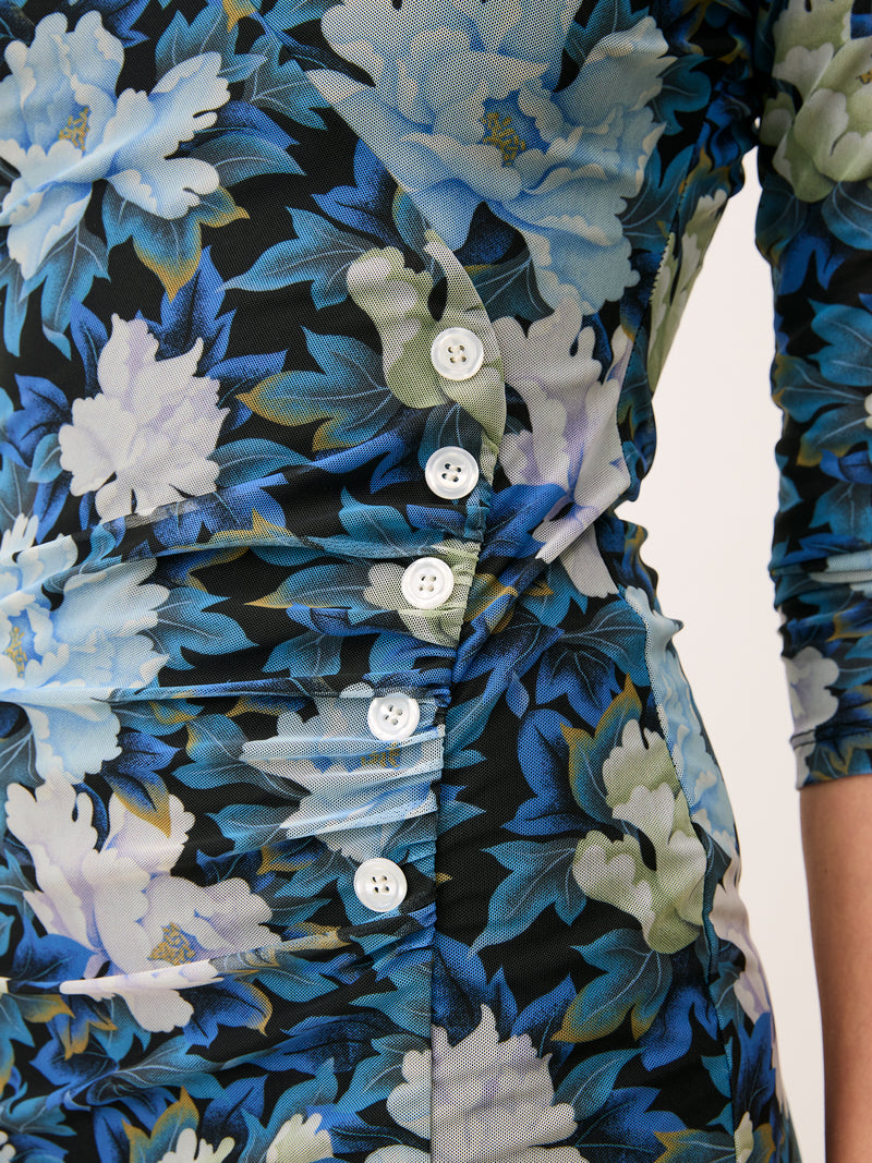 MONIRA blue floral print short faux wrap dress, lifestyle setting by Rouje