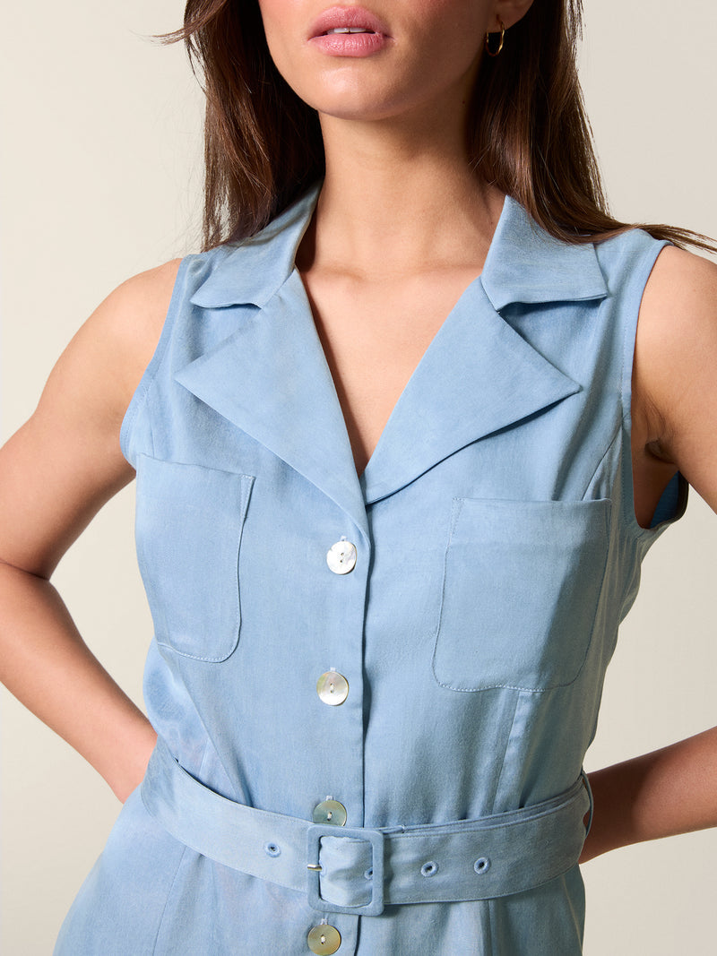 Detail on collar, pearl buttons and belt of blue raquel dress.