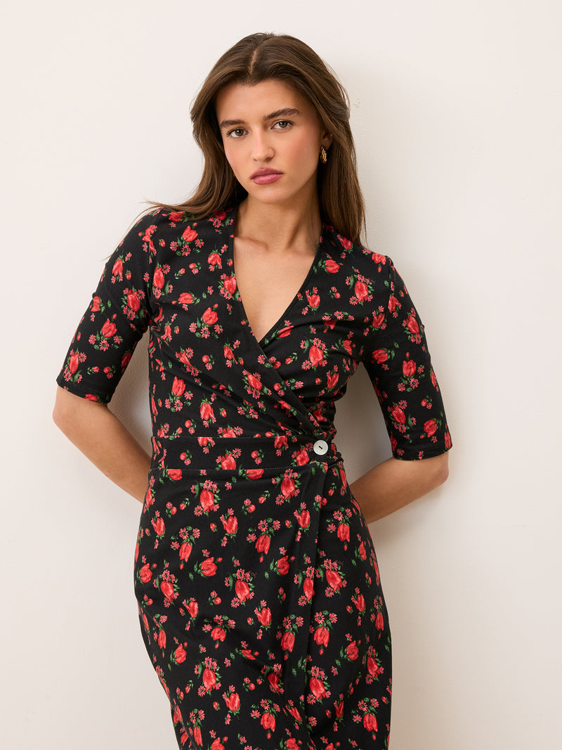 ROXY black floral midi wrap dress worn on a model by Rouje