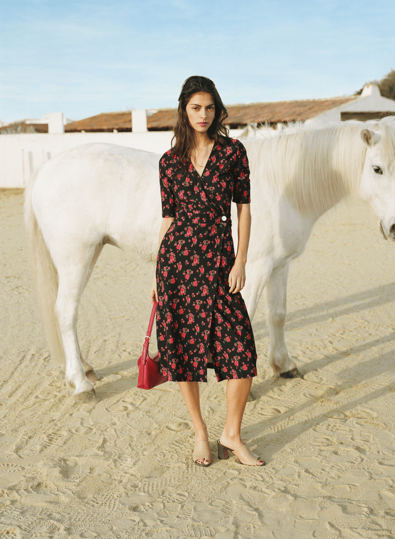 ROXY black floral midi wrap dress, lifestyle setting by Rouje