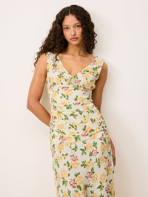 Front view of the Val floral maxi dress worn by a model