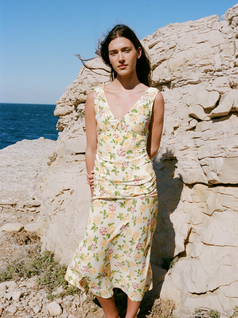 Val floral maxi dress worn by a model, lifestyle setting
