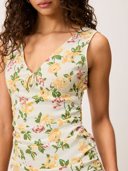 A close-up of the neckline detail on the Val floral maxi dress