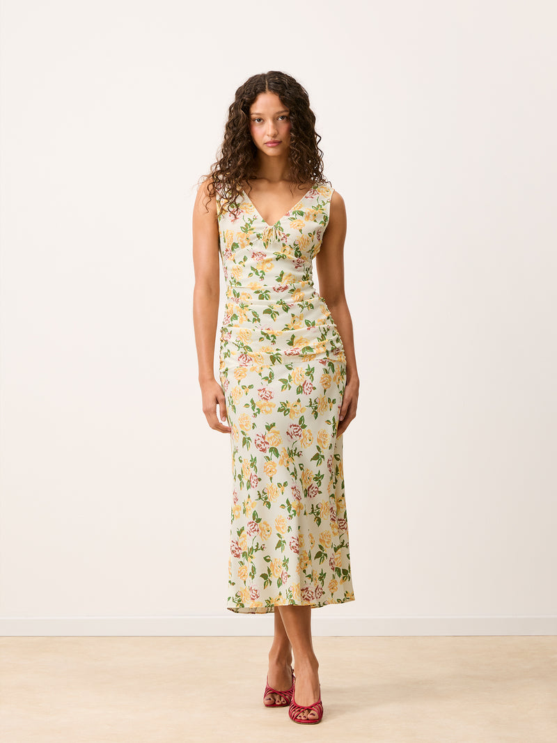 Full-length view of the Val floral maxi dress, worn by a model