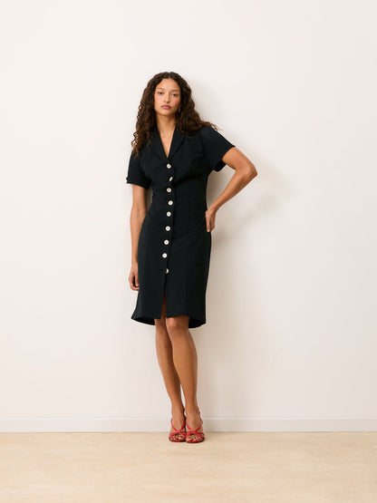 VICTOIRE black cotton midi dress worn on a model, full-length view by Rouje