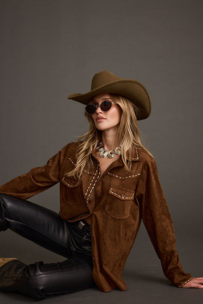 Brown top with elegant accents, a brown corset top essential.