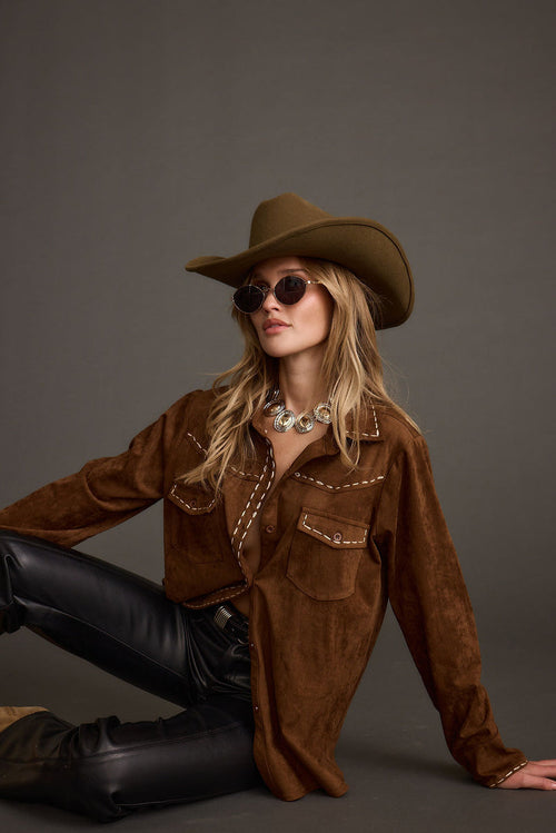 Brown top with elegant accents, a brown corset top essential.