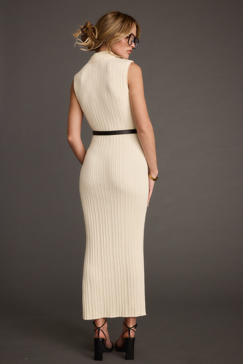 Close-up of the Ruth Cream Turtleneck Sleeveless Sweater Midi Dress showcasing the fabric texture and design details.