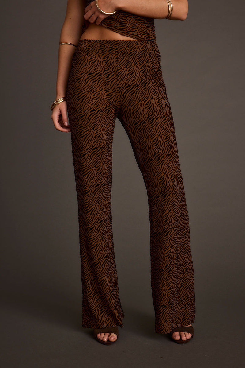 Shop The Look: Safari soirée shown in a complementary styling arrangement.