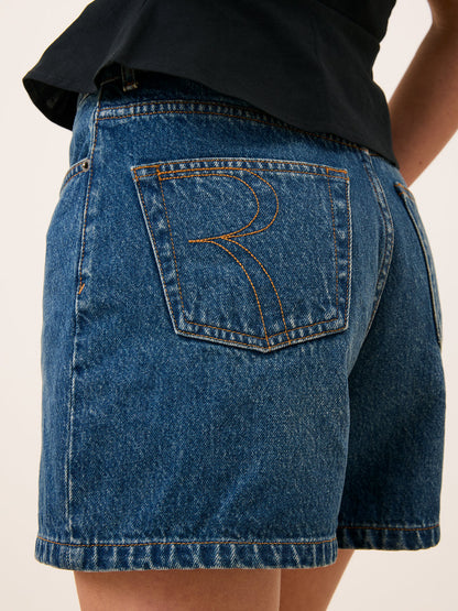 JASMIN indigo denim high-waisted jean mini shorts, lifestyle setting by Rouje