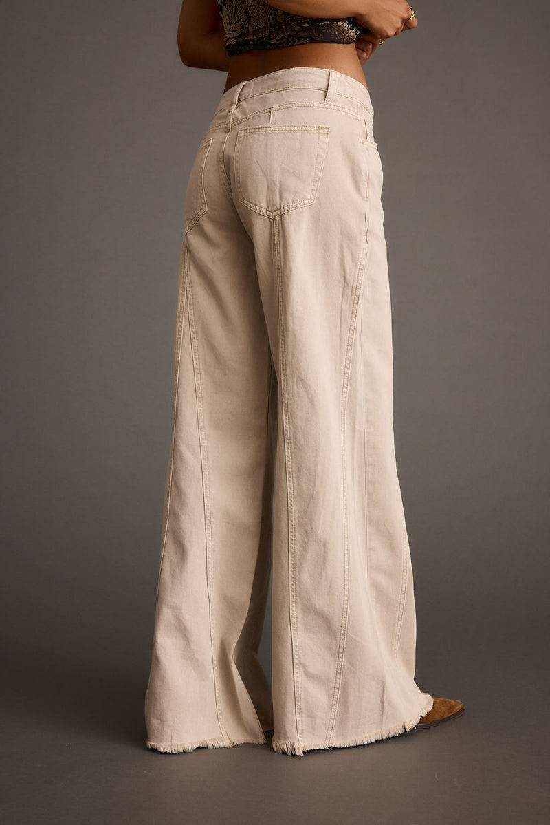 Close-up of the Sierra Beige Low Rise Wide Leg Jean showcasing the fabric texture and design details.