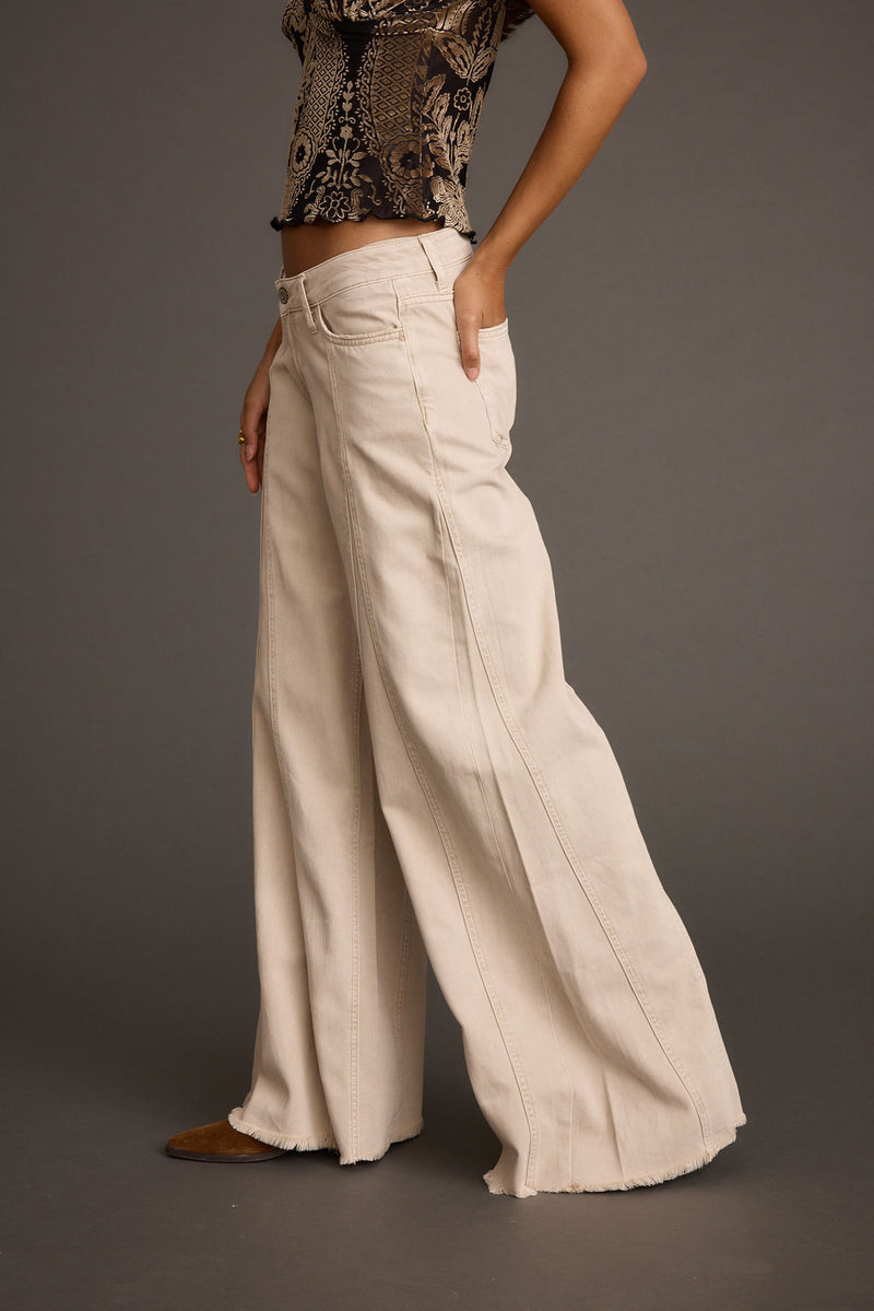 Sierra Beige Low Rise Wide Leg Jean styled in a complete look from an alternate angle.