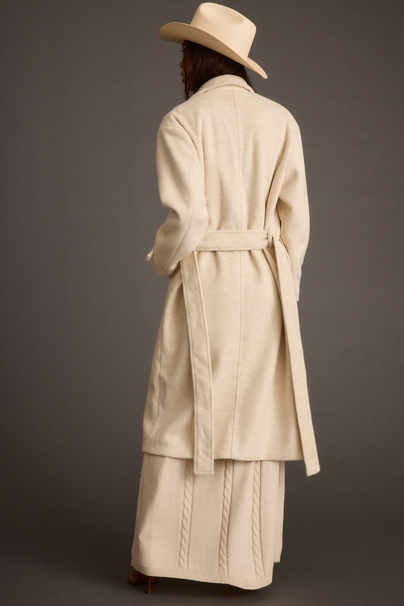 Sinclair Ivory Belted Coat styled in a complete look from an alternate angle.