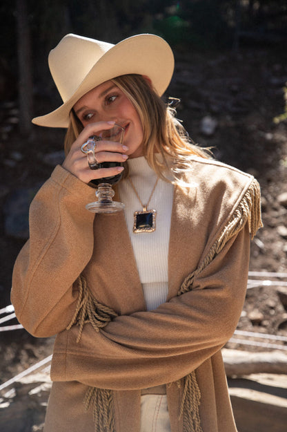 Soleil Statement Necklace shown as part of a styled outfit ensemble.