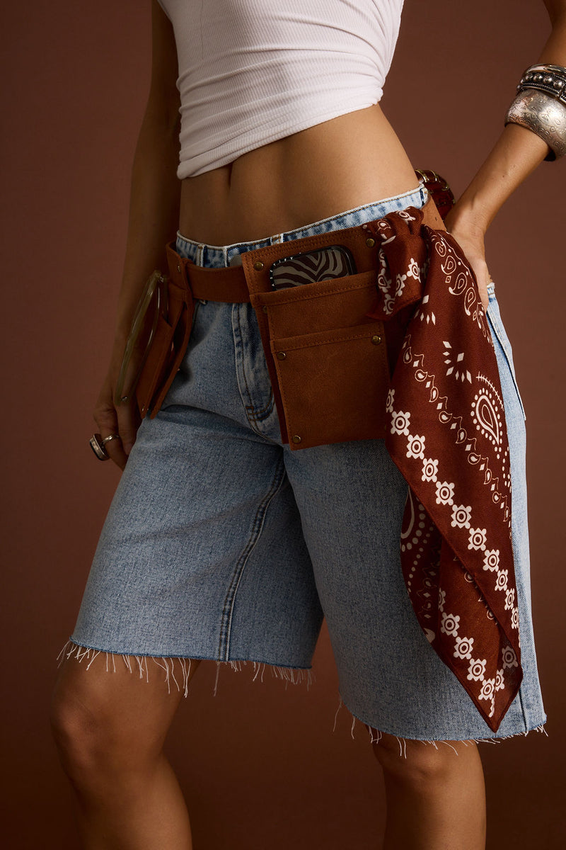 Sparrow Cognac Faux Suede Carpenter Belt shown as part of a styled outfit ensemble.