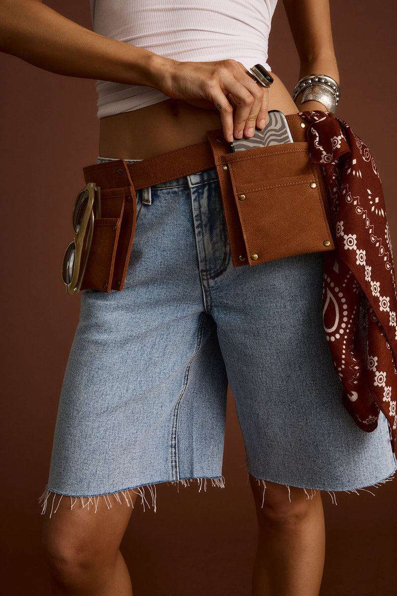 Sparrow Cognac Faux Suede Carpenter Belt paired with complementary accessories for a polished look.
