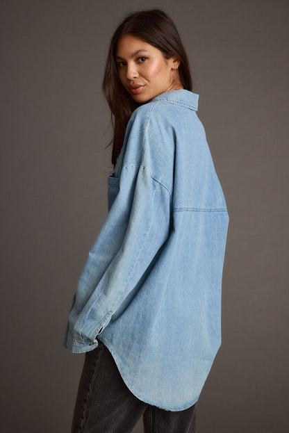 Close-up of the Springsteen Chambray Oversized Button Down Shirt showcasing the fabric texture and design details.