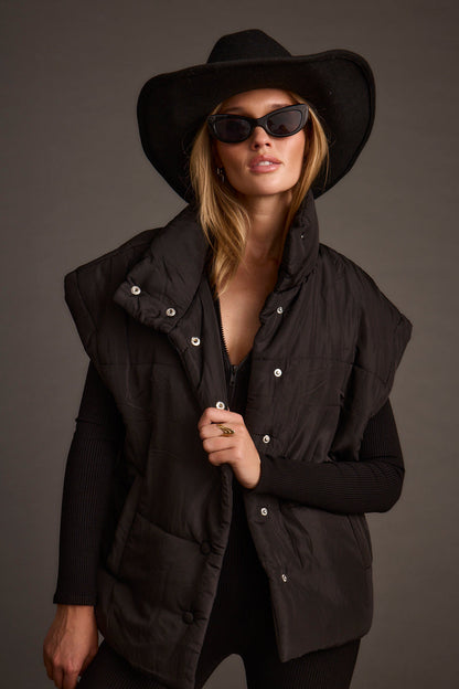 Summit Black Puffer Vest paired with complementary accessories for a polished look.