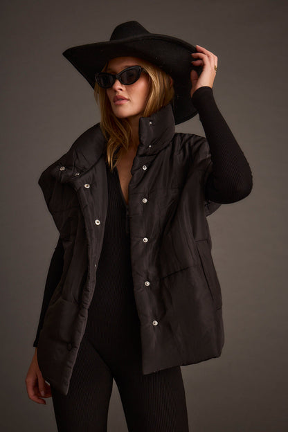 Detail shot of the Summit Black Puffer Vest highlighting the design elements.