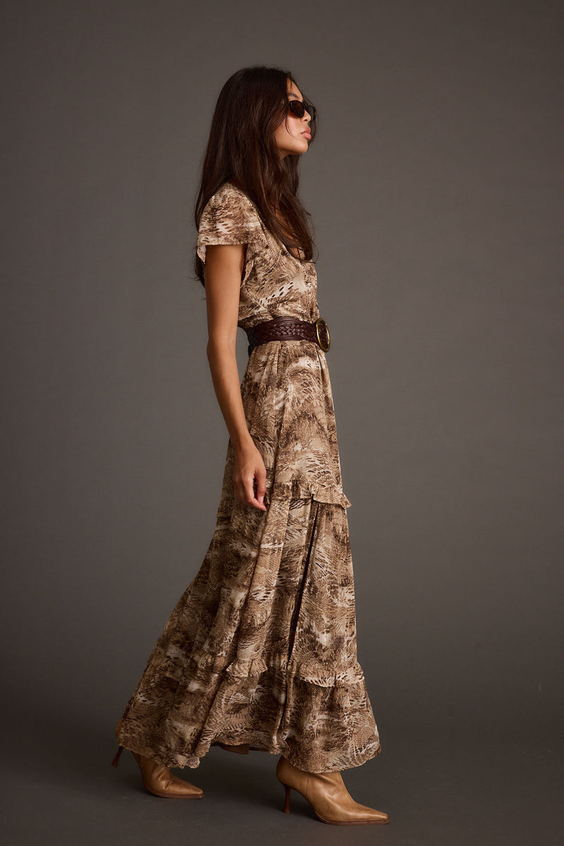 Back view of the mocha maxi dress showing the silhouette and fit.