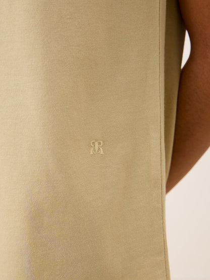 TOM beige loose-fit T-shirt, lifestyle setting by Rouje