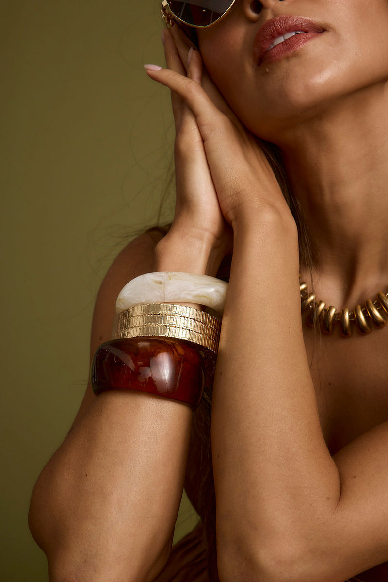 Close-up of the Tabby Set of 2 Chunky Bangles showcasing the fabric texture and design details.