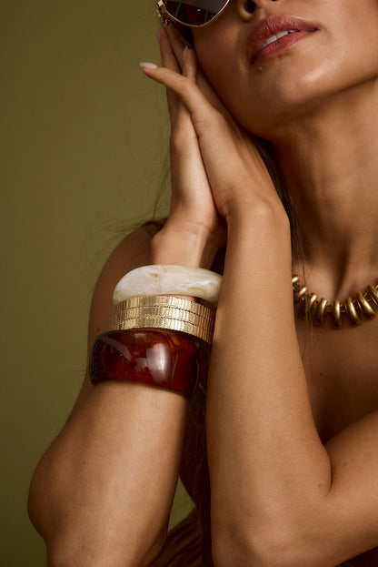 Close-up of the Tabby Set of 2 Chunky Bangles showcasing the fabric texture and design details.