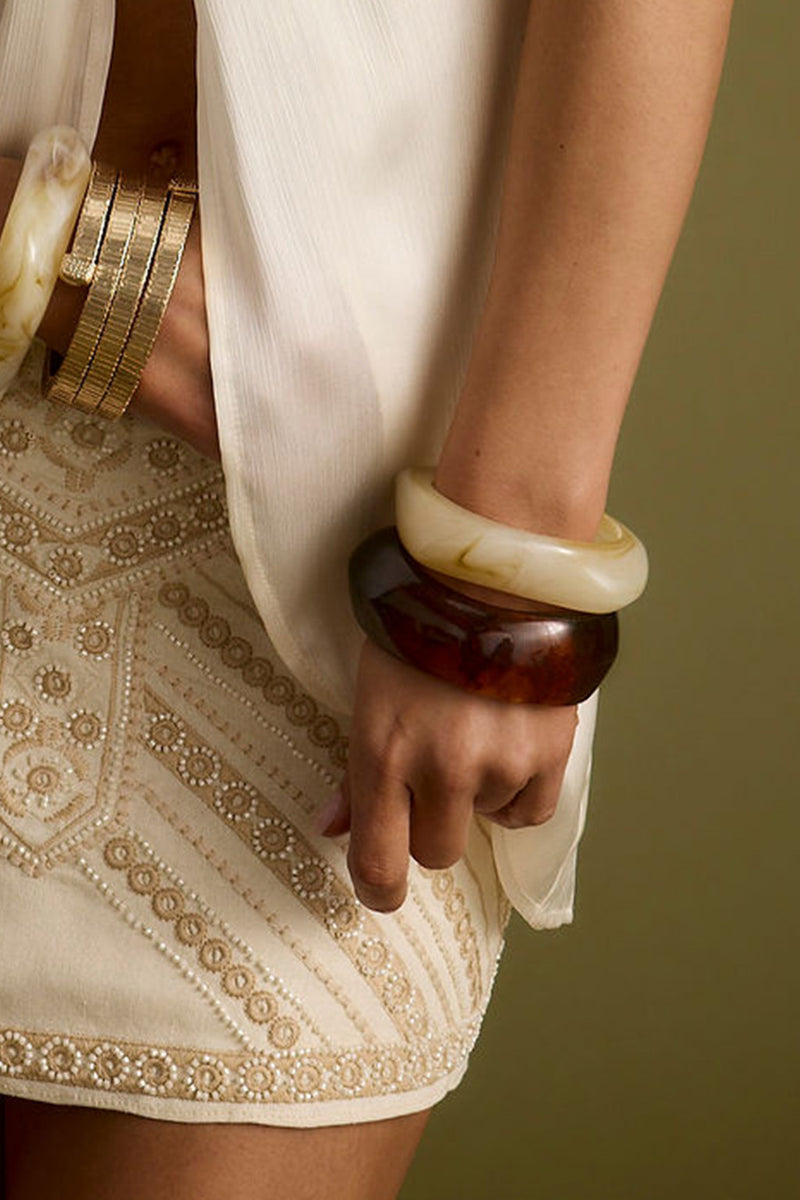 Full-length view of the piece showing the drape and movement.