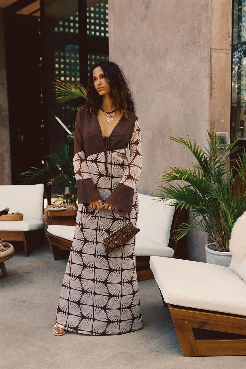 Back view of the maxi dress showing the silhouette and fit.