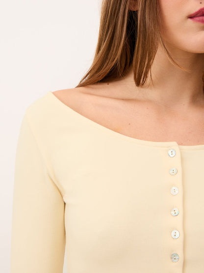 BEATA vanilla slim-fit cotton top worn on a model by Rouje