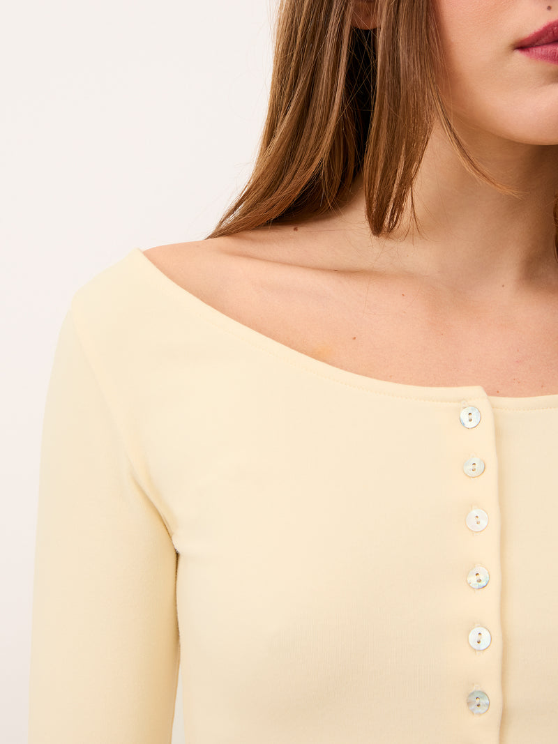 BEATA vanilla slim-fit cotton top worn on a model by Rouje
