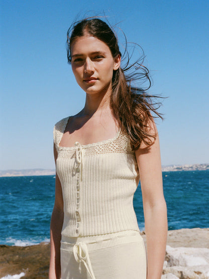 Tarek ecru crochet top worn by a model, lifestyle setting