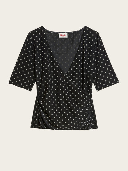 YURA black polka-dot mesh wrap effect top, flat packshot by Rouje
