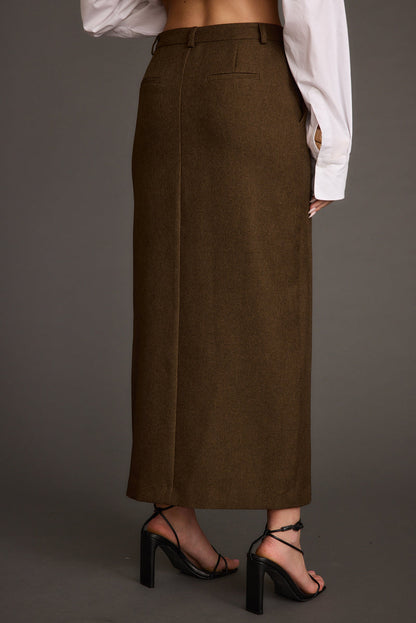 Lifestyle shot of the mocha midi skirt styled for day-to-night versatility.