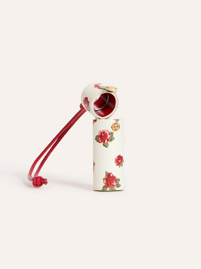 DISCRET ecru floral leather lipstick case, front view by Rouje