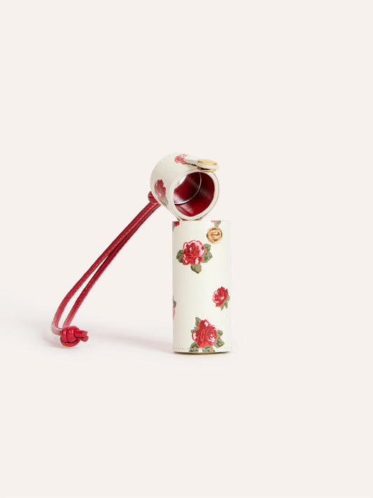 DISCRET ecru floral leather lipstick case, front view by Rouje