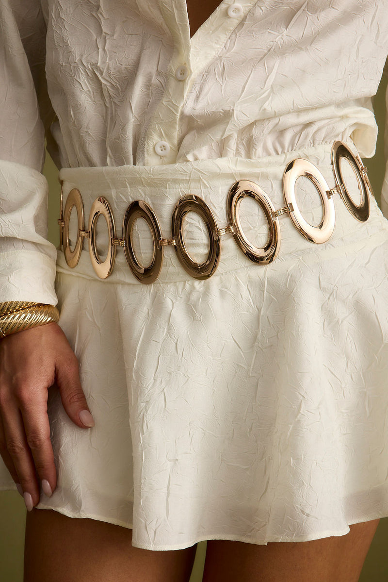 Alternate view of the gold belt showing the design and craftsmanship.