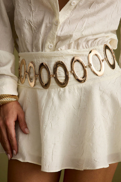 Alternate view of the gold belt showing the design and craftsmanship.