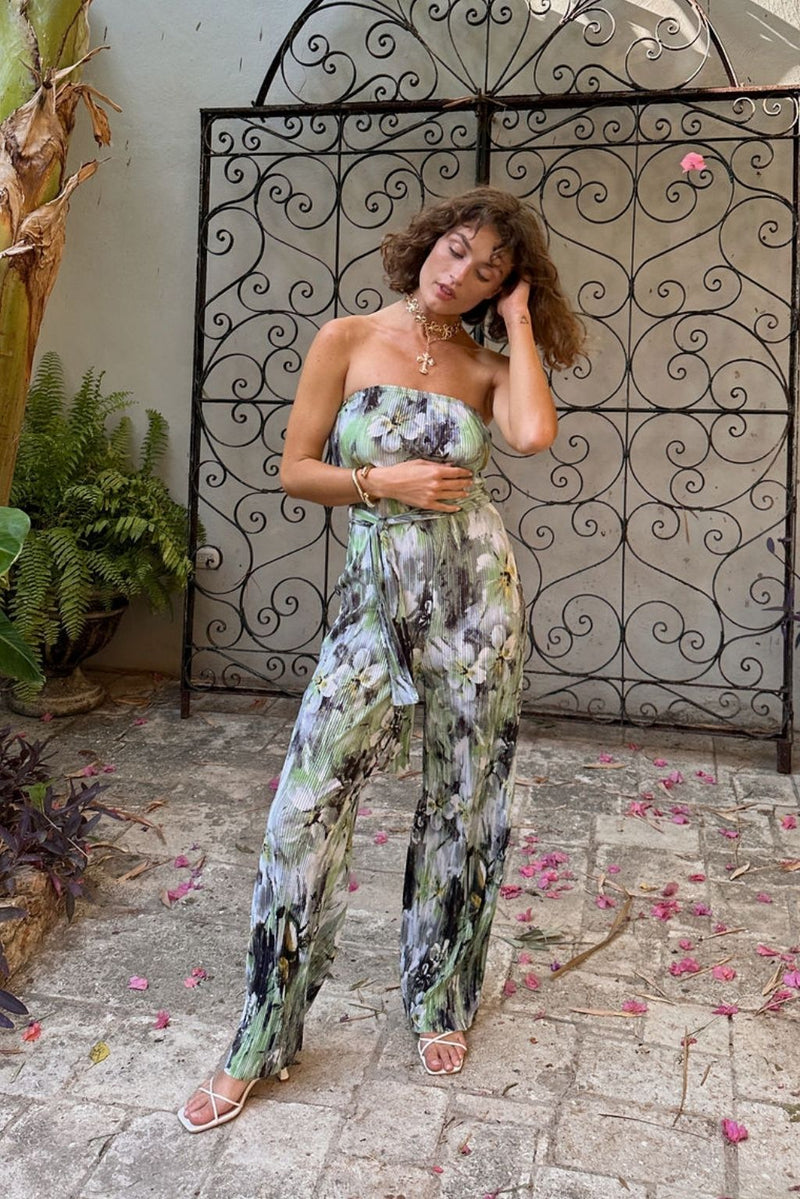 Close-up of the Verbena Plisse Strapless Jumpsuit showcasing the fabric texture and design details.