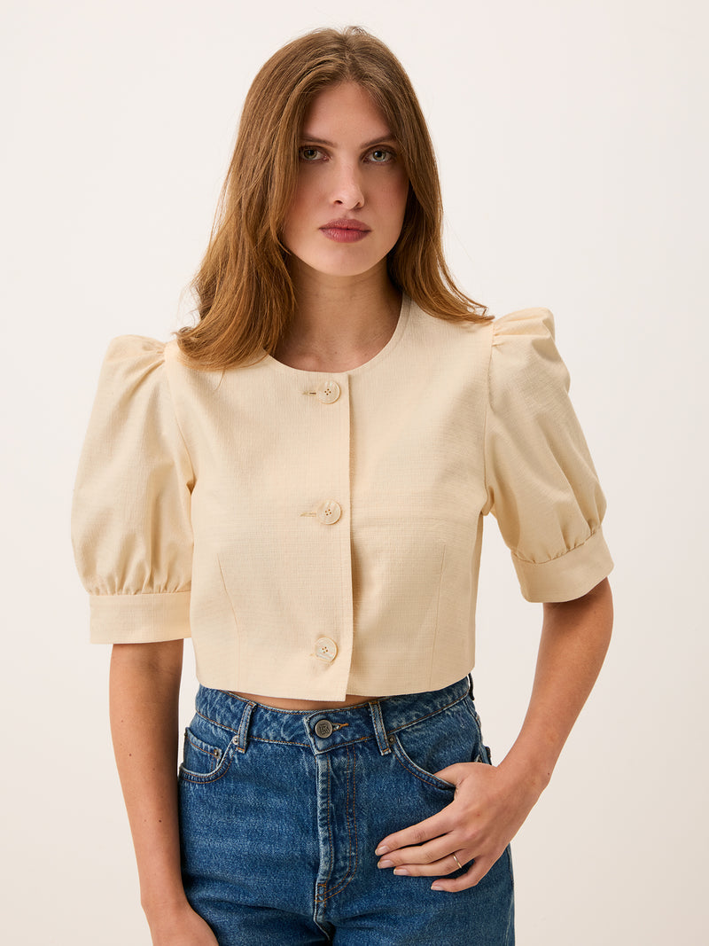 MAYA beige cotton bolero jacket worn on a model by Rouje