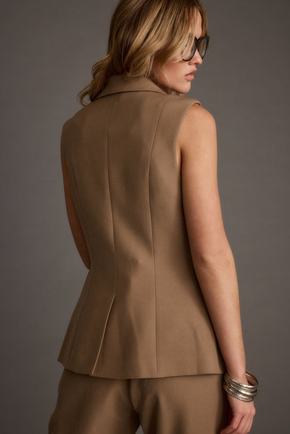 Full-length view of the blazer showing the drape and movement.