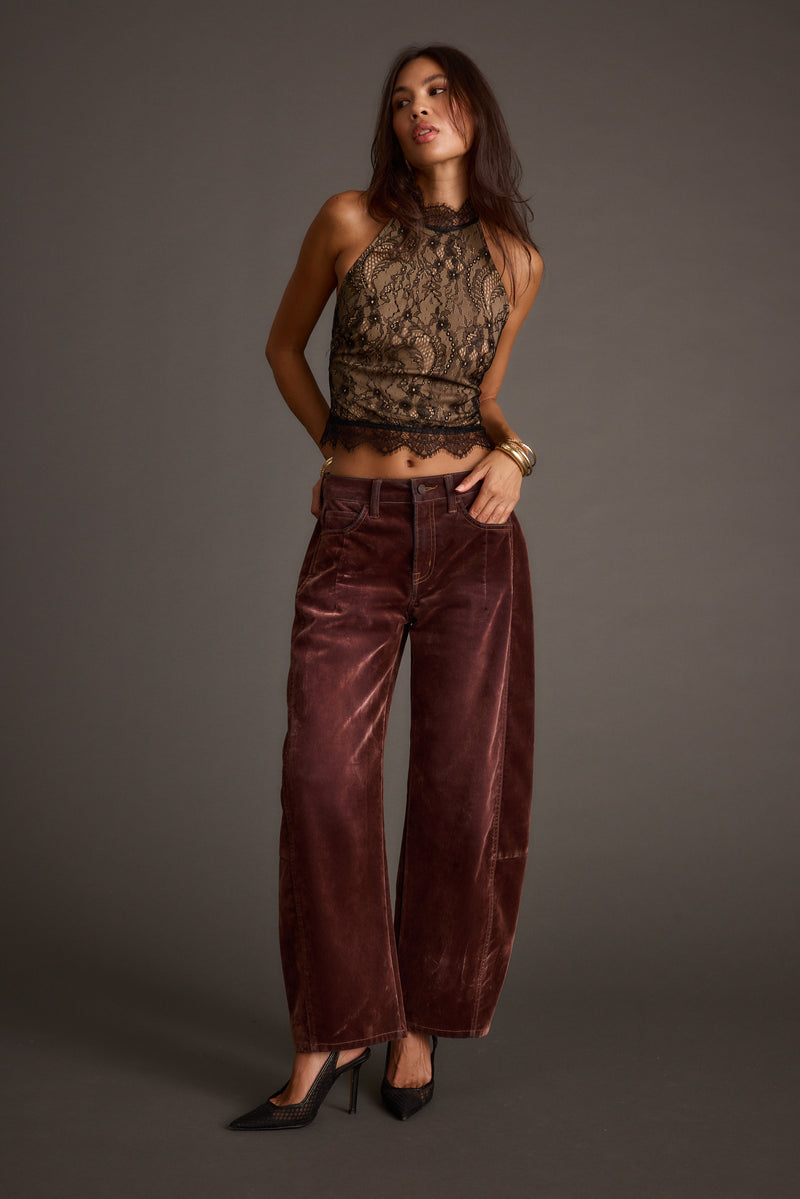 Back view of the black lace halter top showing the silhouette and fit.